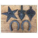 Cast iron trivets, horseshoes, architectural star