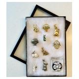 11 costume jewelry Easter brooches in riker case
