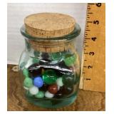 Glass jar with marbles