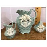 Porcelain pitchers and basket