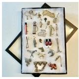 25 assorted costume jewelry brooches
