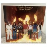 Lynyrd Skynyrd original fire cover LP with inserts