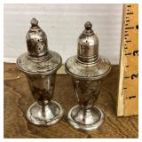 Weighted sterling silver salt and pepper shakers