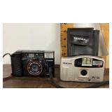 Canon Sure Shot and Pentax PC-55 cameras