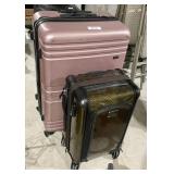 2 hard-side suitcases with 4 wheels