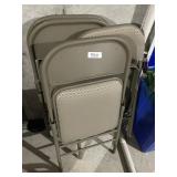 4 metal folding chairs with padded seat