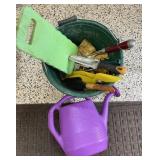 Equestrian bucket with gardening tools