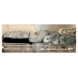 Top shelf in front hall closet w/woven throws