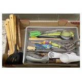 Flat of kitchen gadgets in mesh organizer