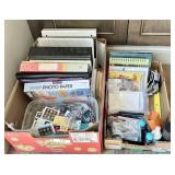 2 boxes of office supplies, binders, journals