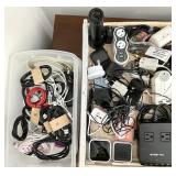 Large group of phone chargers, power cords,