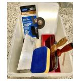 Drywall supplies in lidded tote