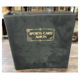 Sports card album with baseball cards