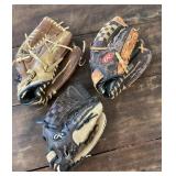 3 baseball gloves