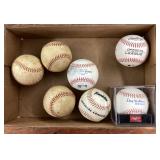 7 assorted baseballs