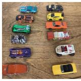 12 Hot Wheels type diecast cars
