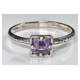 Sterling silver ring with purple stone