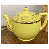 Yellow ceramic teapot