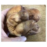 Carved wooden weeping Buddha figure