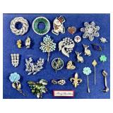 Costume jewelry brooches and pins