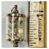 14k gold pendant with tiny seashells