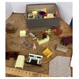 Wood, plastic, and metal dollhouse furniture