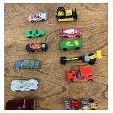 12 Hot Wheel style diecast cars