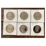 6 Kennedy half dollars
