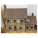 Wooden cabin model house with tin roof
