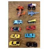 12 Hot Wheel style diecast vehicles
