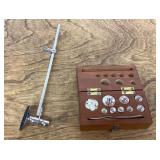 Small scale weights plus graduated scale marker