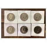 6 Kennedy half dollars