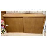 Mid century cabinet with sliding doors