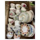 15 porcelain teacups and saucers
