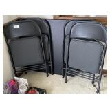 Black card table and 4 matching padded chairs