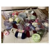 Kitchen trash bag full of yarn