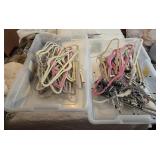 2 totes of flocked and skirt hangers