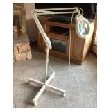 Magnifying adjustable task lamp
