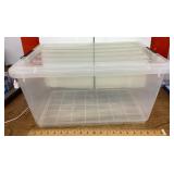 Clear plastic tote with locking lid