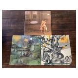 3 sealed LPs