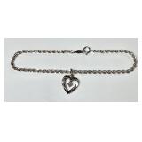 Sterling silver bracelet with heart charm