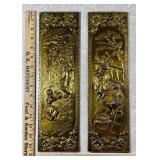 Pair of English repousse brass wall plaques