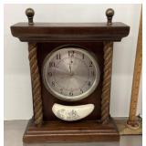 Clock with scrimshaw decoration