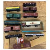 11 HO box cars, truck, flatcar