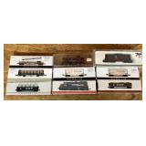 9 N gauge train cars