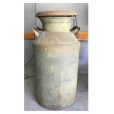 Antique milk can 2' tall