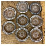 Set of silverplate rimmed glass coasters