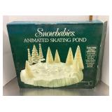 Dept 56 animated Snowbabies skating pond
