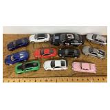 11 assorted toy cars
