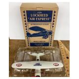 Diecast Lockheed Air Express plane bank